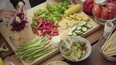 Women-preparing-vegetable-salad-together